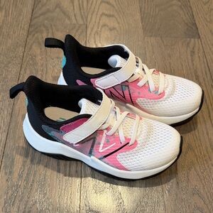 Girls New Balance Rave sneakers. Excellent condition. Wore only one time.